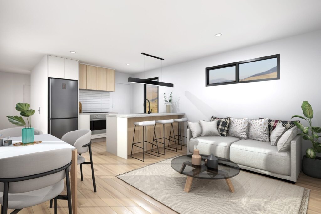 Open-plan living area inside a two-bedroom portable home NZ, showcasing modern kitchen, dining and lounge design for compact living in New Zealand.