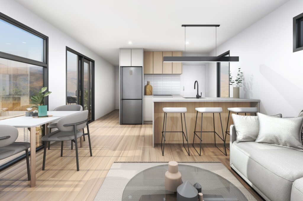 Bright and modern kitchen and dining area in a Paragon Portables two-bedroom home NZ with natural timber finishes and minimalist interior design.